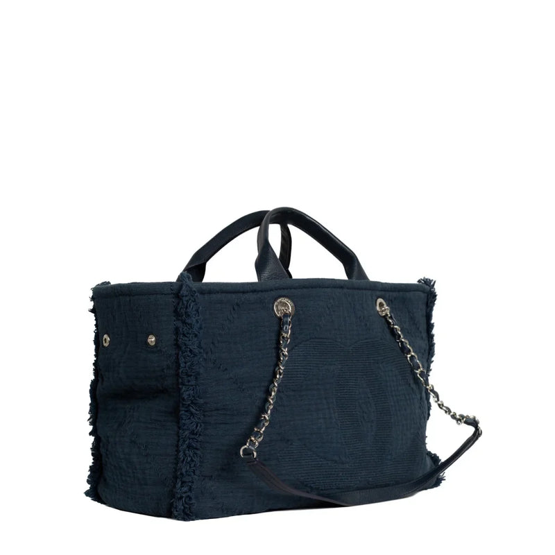 sac de seconde main deauville chanel  en tissu bleu côté