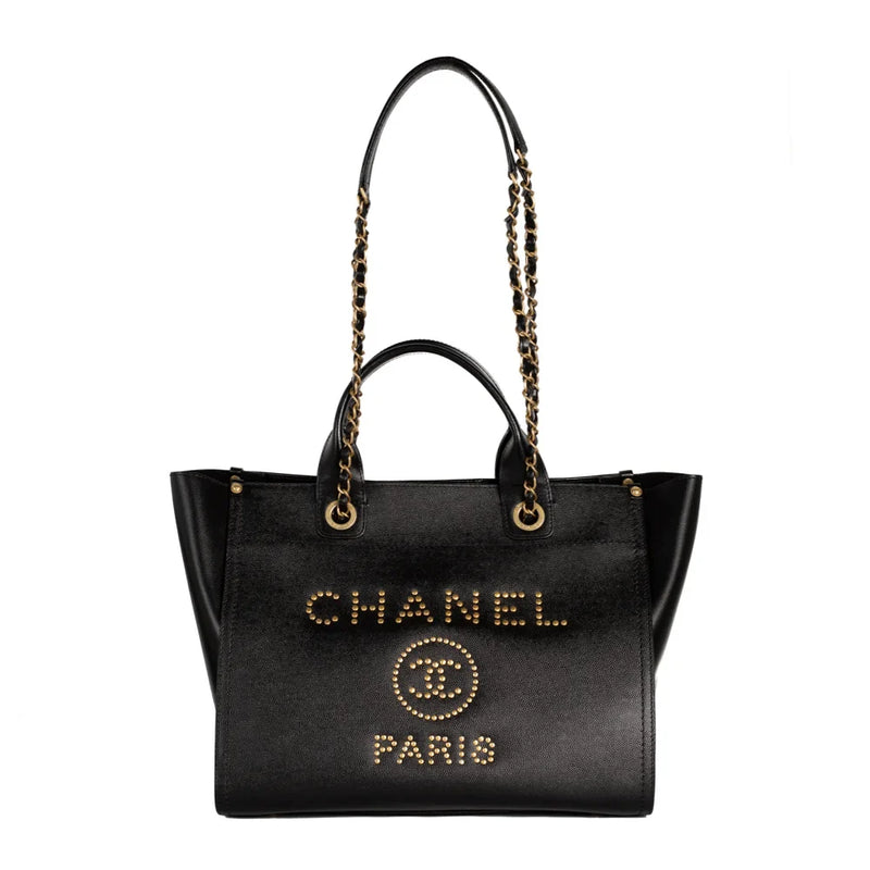 sac de seconde main deauville chanel  en cuir noir anse