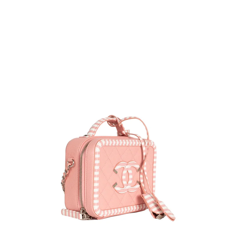 sac de seconde main filigree chanel  en cuir rose côté