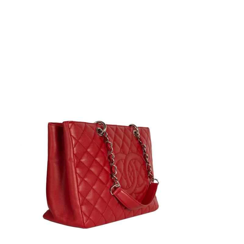 sac de seconde main gst chanel en cuir rouge côté