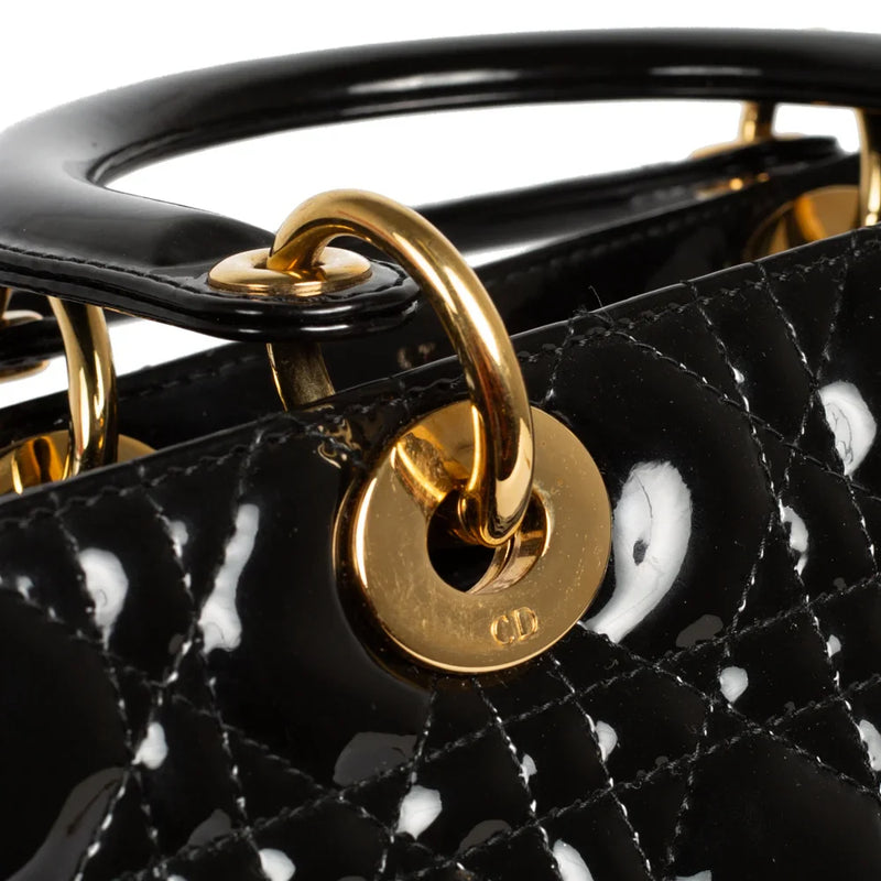 sac de seconde main lady dior  en cuir verni noir défaut 1