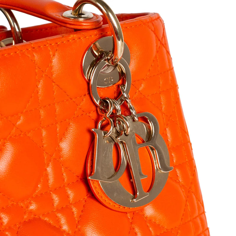 sac de seconde main lady dior  dior  en cuir orange  défaut 1