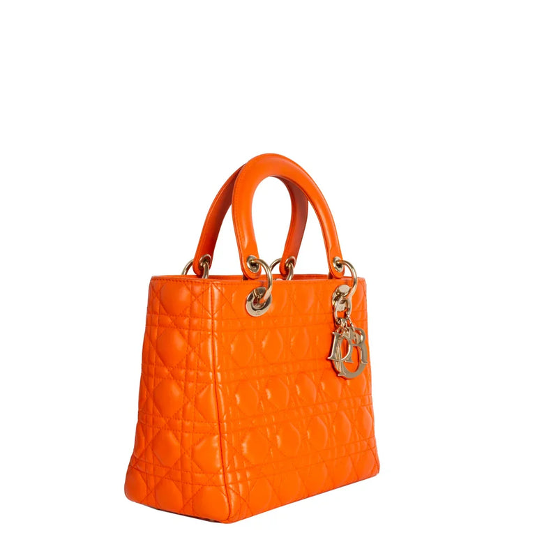 sac de seconde main lady dior  dior  en cuir orange  côté