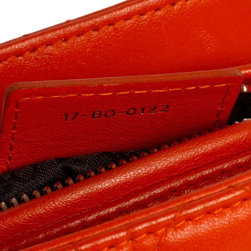 sac de seconde main lady dior  dior  en cuir orange  numéro de série