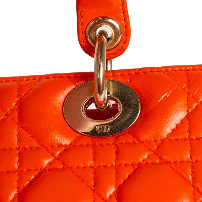 sac de seconde main lady dior   en cuir orange  défaut 3