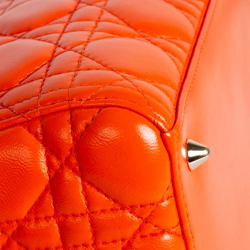 sac de seconde main lady dior   en cuir orange  coin 