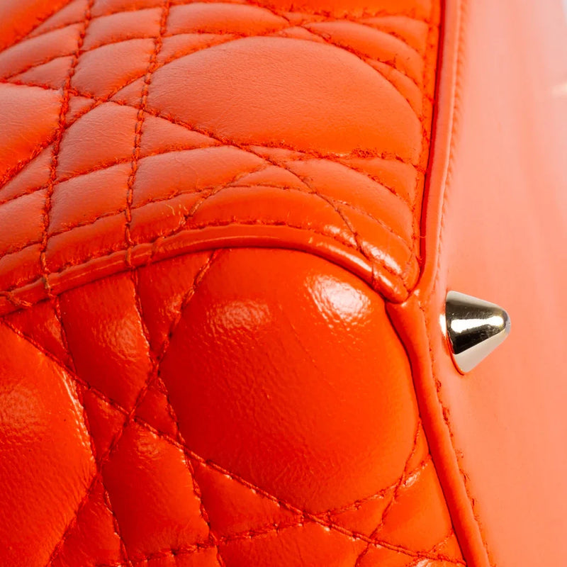 sac de seconde main lady dior   en cuir orange  coin 