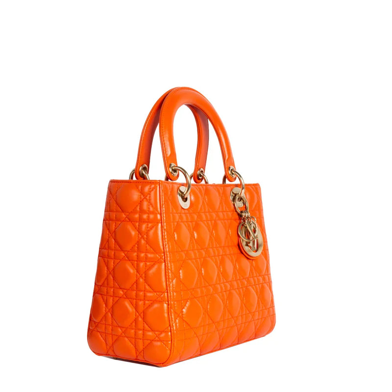 sac de seconde main lady dior   en cuir orange  côté