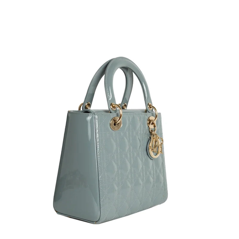 sac de seconde main lady  dior en cuir verni bleu côté