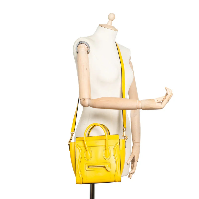 sac de seconde main luggage céline  en cuir jaune porté 1