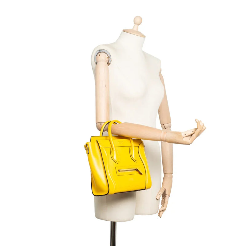 sac de seconde main luggage céline  en cuir jaune porté 2