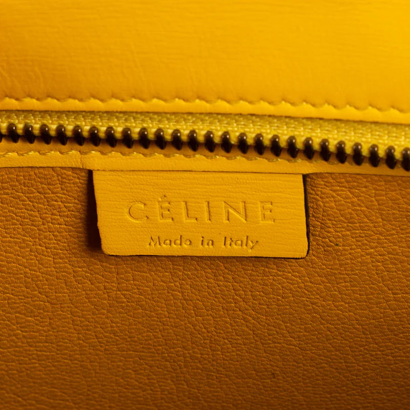 sac de seconde main luggage céline  en cuir jaune label