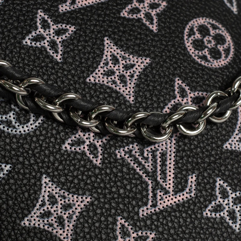 sac de seconde main mahina louis vuitton  en cuir noir défaut 2