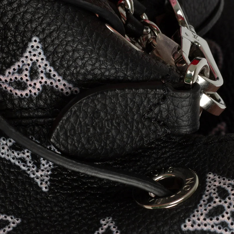 sac de seconde main mahina louis vuitton  en cuir noir label