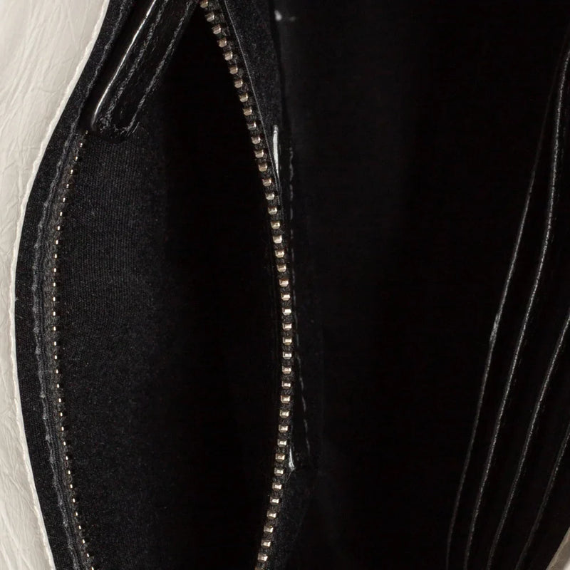 sac de seconde main niki saint laurent en cuir gris  intérieur