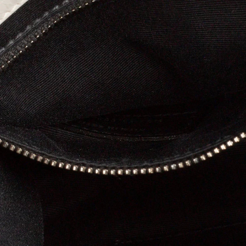 sac de seconde main niki saint laurent en cuir gris  numéro de série