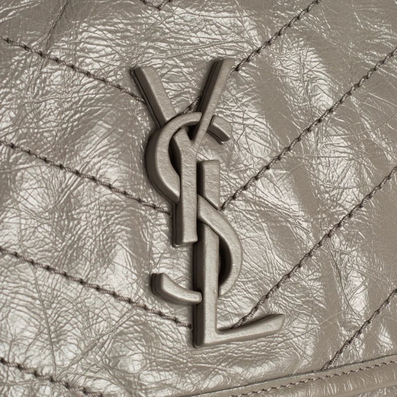 sac de seconde main niki  saint laurent  en cuir gris défaut 1