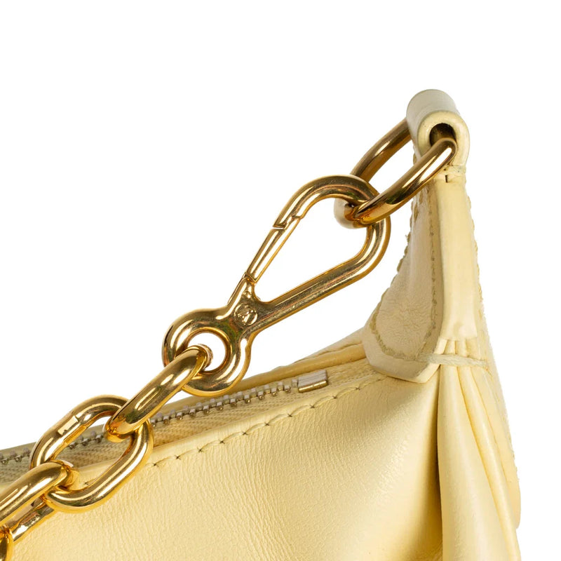 sac de seconde main over the moon louis vuitton en cuir jaune défaut 1