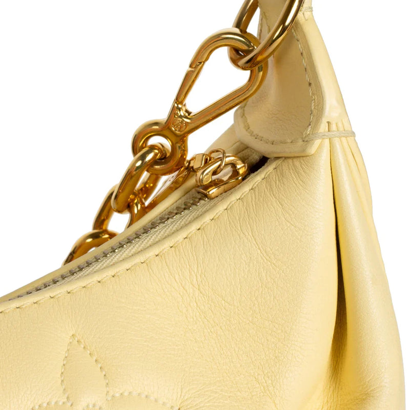 sac de seconde main over the moon louis vuitton en cuir jaune défaut 3