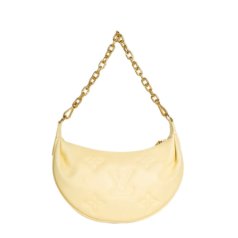 sac de seconde main over the moon louis vuitton en cuir jaune dos