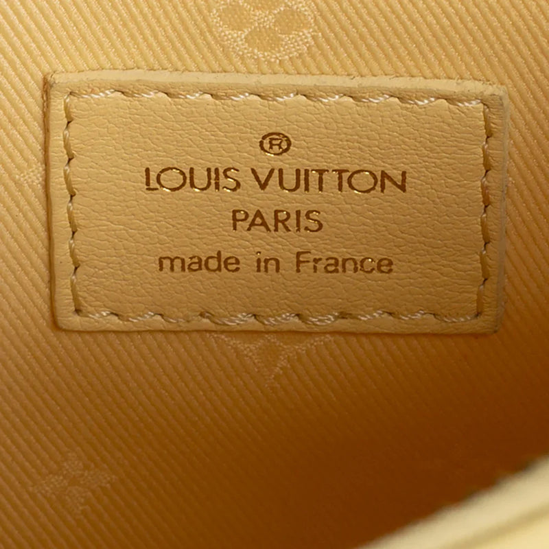 sac de seconde main over the moon louis vuitton en cuir jaune label