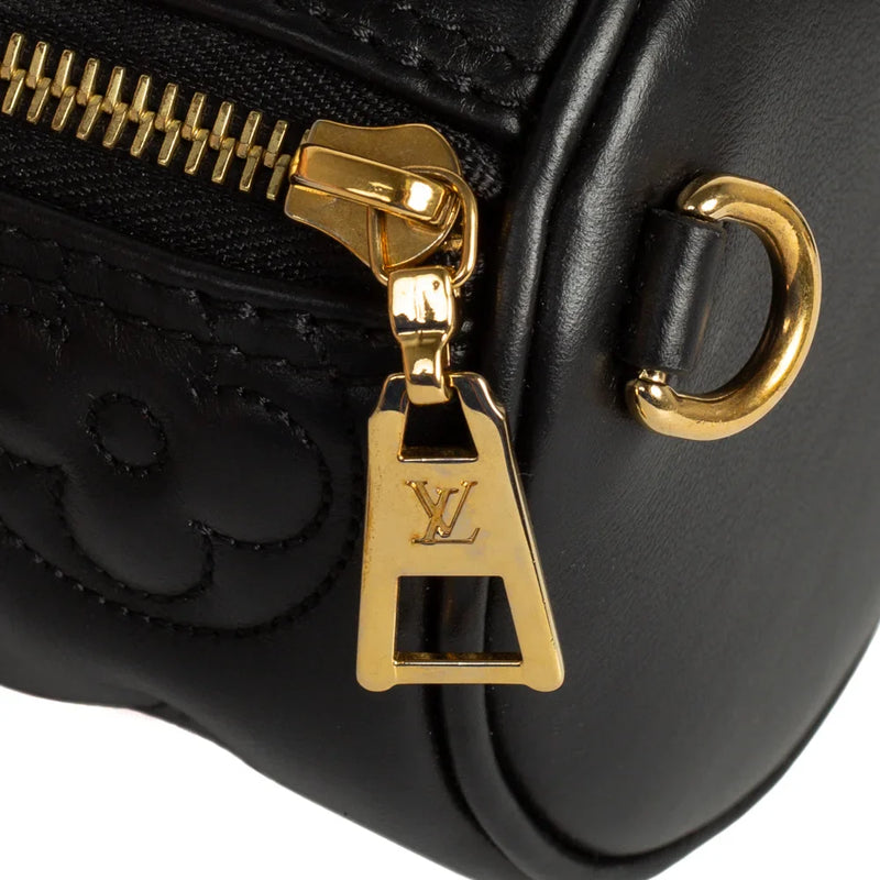 sac de seconde main papillon  louis vuitton  en cuir noir défaut 1