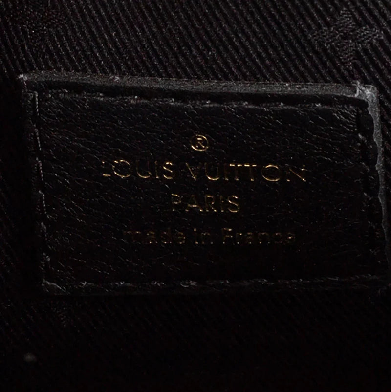 sac de seconde main papillon  louis vuitton  en cuir noir label