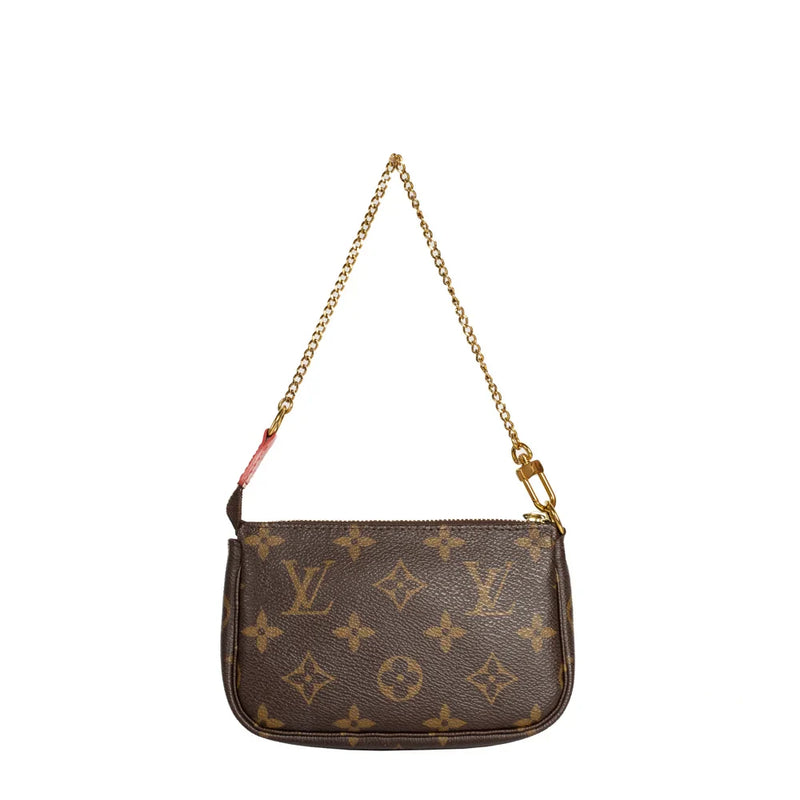 sac de seconde main pochette accessoires louis vuitton  en toile monogram marron dos