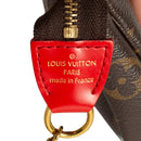 sac de seconde main pochette accessoires louis vuitton  en toile monogram marron label