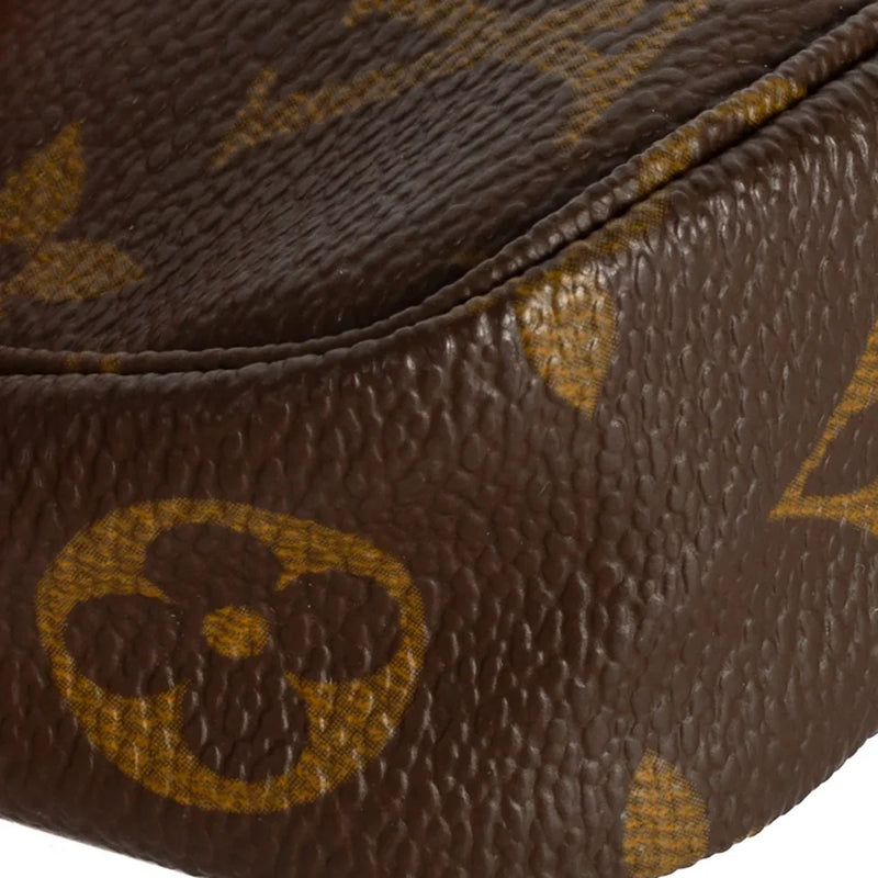 sac de seconde main pochette accessoires louis vuitton en toile monogram marron coin 