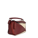 sac de seconde main puzzle loewe en cuir rouge côté