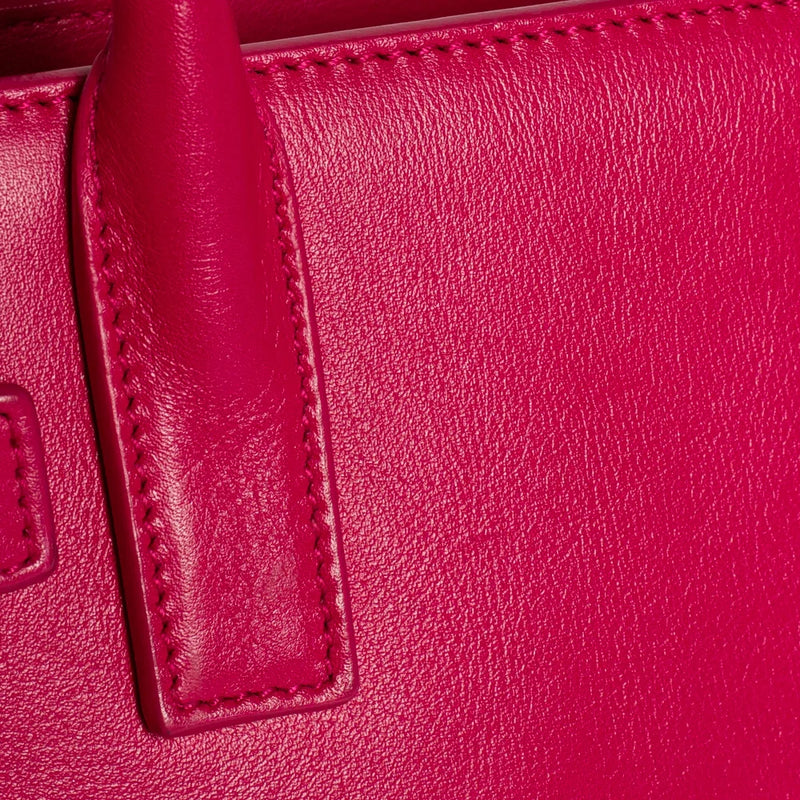 sac de seconde main sac de jour saint laurent en cuir rose  défaut 2