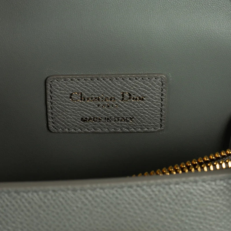 sac de seconde main saint honoré dior  en cuir gris label