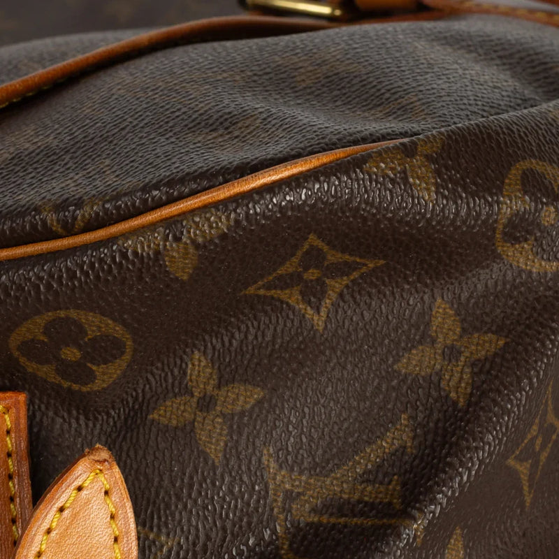 sac de seconde main saumur louis vuitton en toile monogram marron coin