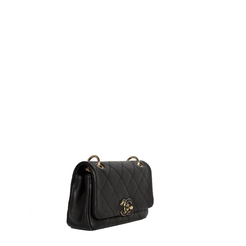 sac de seconde main single flap chanel en cuir noir côté