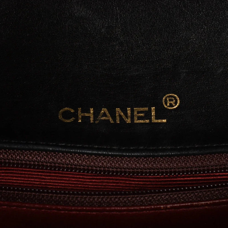 sac de seconde main single flap chanel en cuir noir label