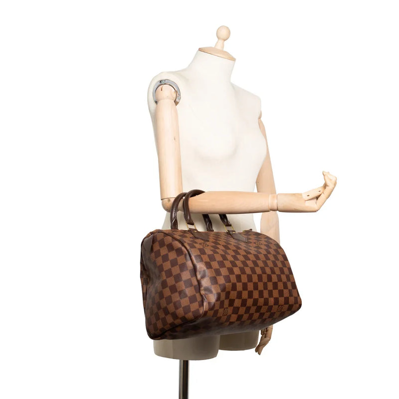 sac de seconde main speedy louis vuitton en toile damier ébène porté 1