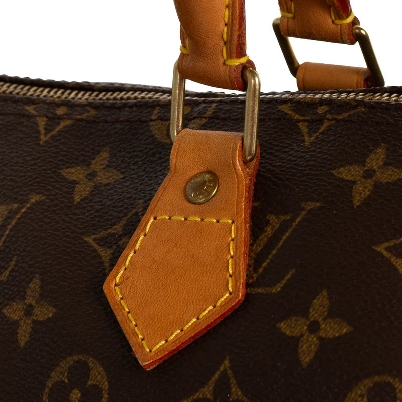 sac de seconde main speedy louis vuitton en toile monogram marron défaut 3