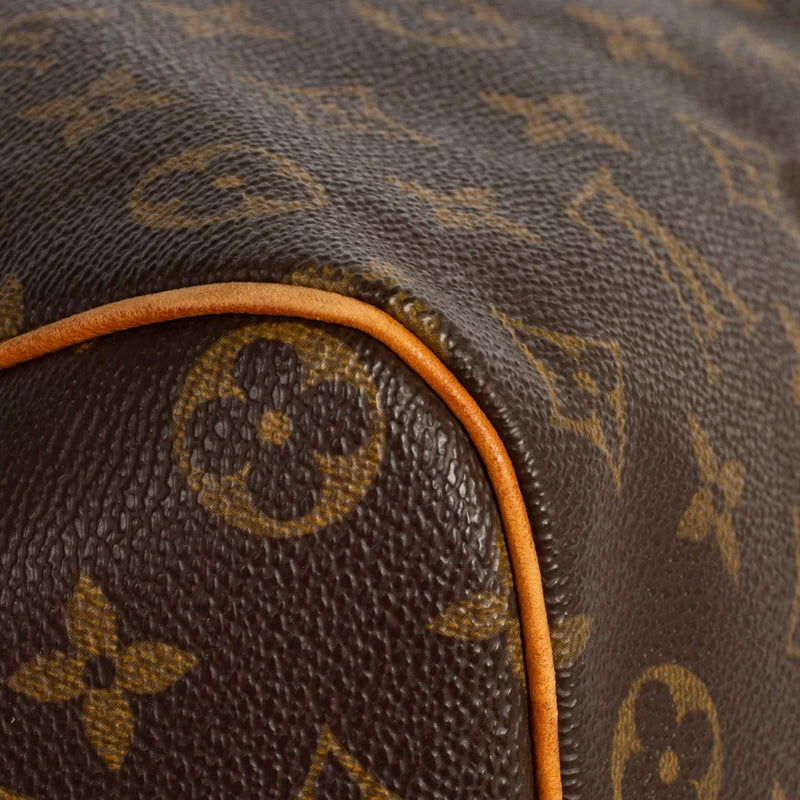 sac de seconde main speedy louis vuitton en toile monogram marron coin 