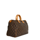 sac de seconde main speedy louis vuitton en toile monogram marron côté