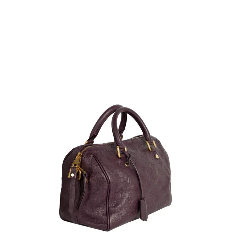 sac de seconde main speedy louis vuitton en cuir empreinte violet côté