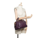 sac de seconde main speedy louis vuitton en cuir empreinte violet porté 2