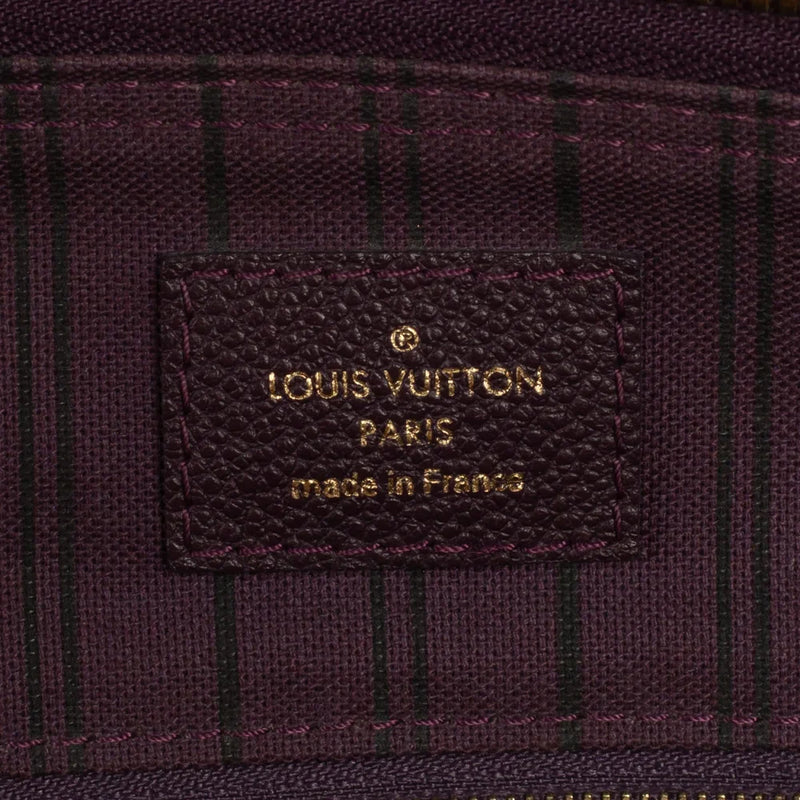 sac de seconde main speedy louis vuitton en cuir empreinte violet label