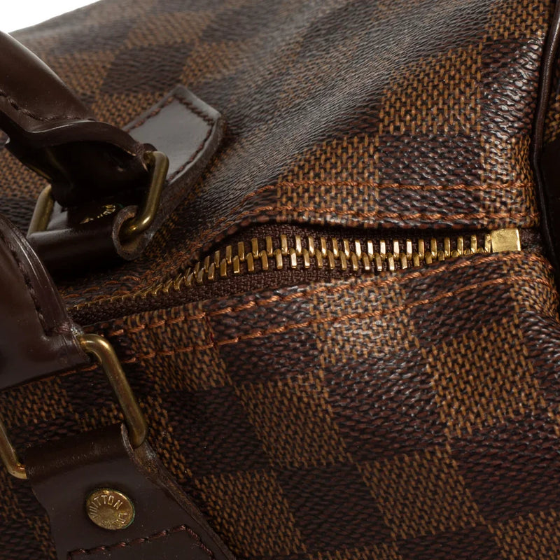 sac de seconde main speedy louis vuitton en toile damier ébène défaut 2