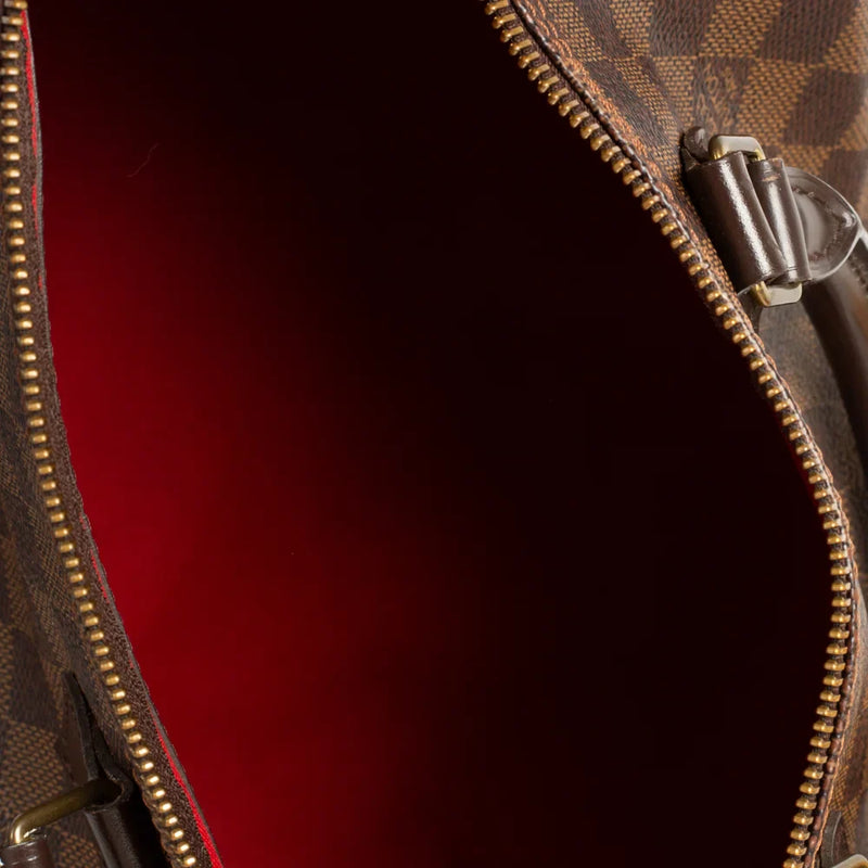 sac de seconde main speedy louis vuitton en toile damier ébène intérieur