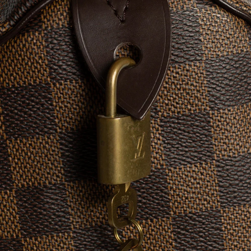 sac de seconde main speedy  louis vuitton  en toile damier ébène défaut 2