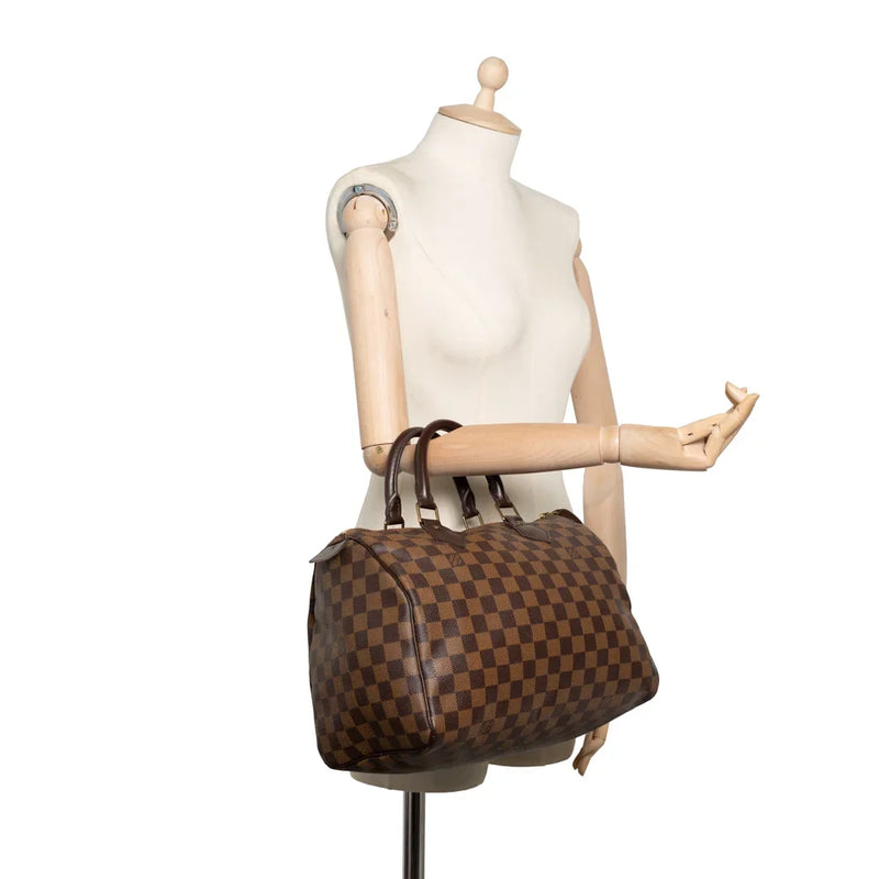 sac de seconde main speedy  louis vuitton  en toile damier ébène porté 1