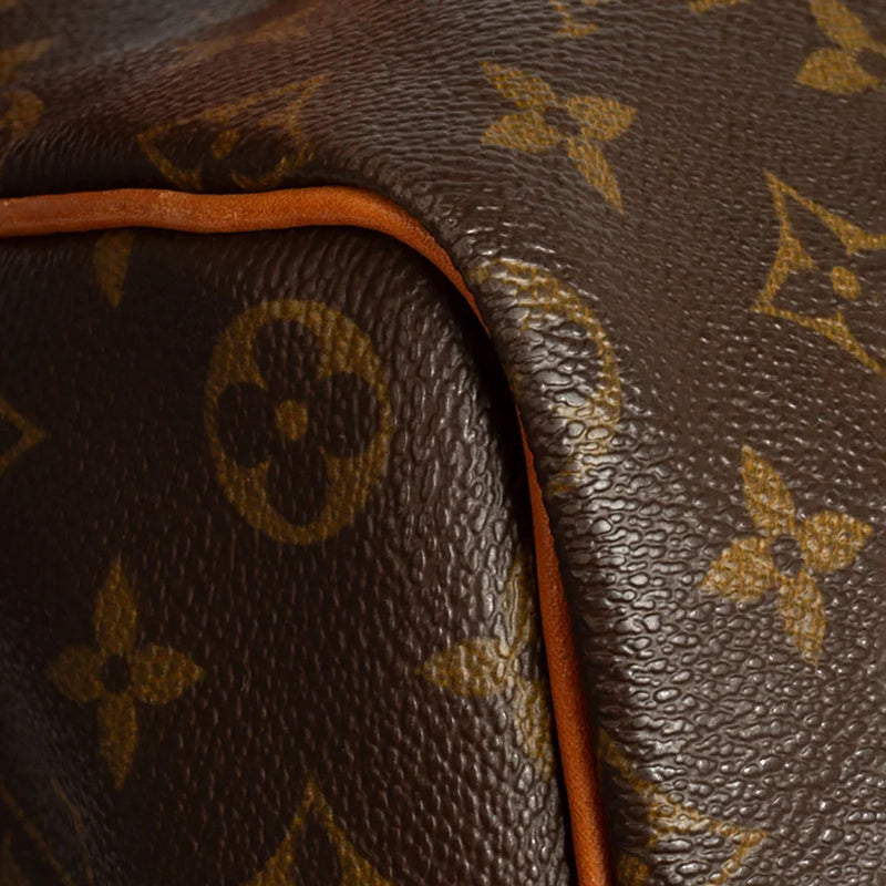 sac de seconde main speedy louis vuitton en toile monogram marron coin 