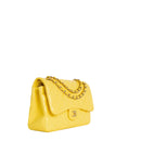 sac de seconde main timeless chanel  en cuir jaune  côté