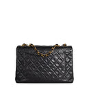 sac de seconde main timeless chanel  en cuir noir  dos